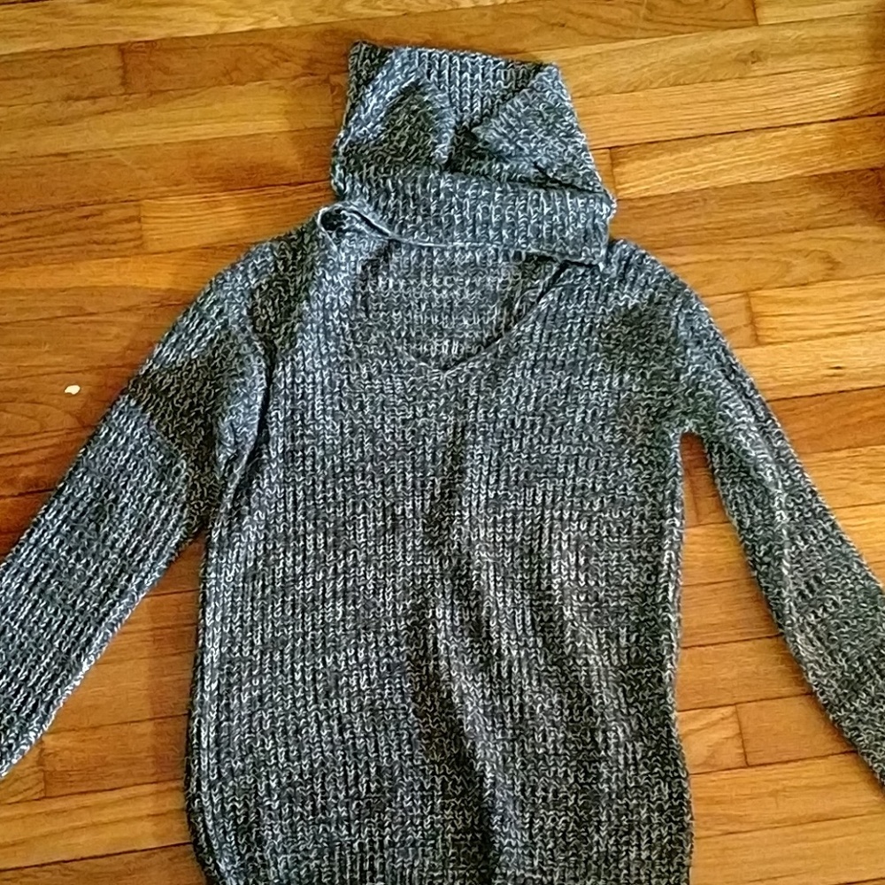 Grey and white sweater w cut out